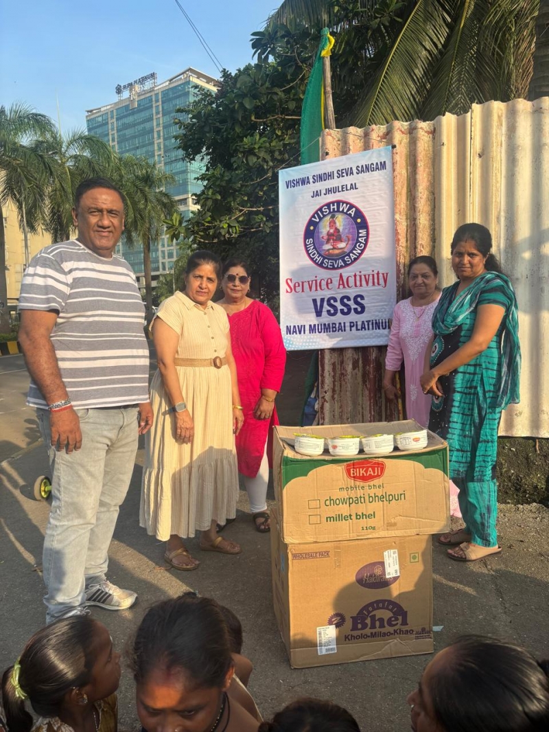 Distribution of Bhel bowl containers ready to eat to poor and needy children.